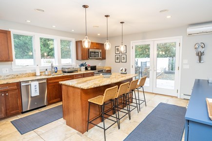 Eastham Cape Cod vacation rental - Bright, airy eat-in kitchen with access to pool and patio