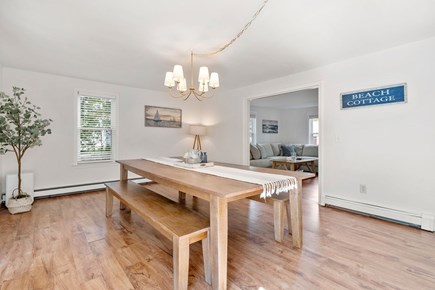 Yarmouth Cape Cod vacation rental - Large bench style dining table with seating for 8-10