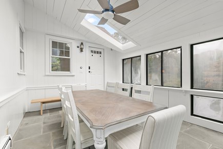West Falmouth Cape Cod vacation rental - Heated sunroom off the laundry room with access to the patio!