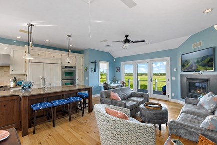 Wellfleet, Chipman`s Cove Lookout Cape Cod vacation rental - Open living room and kitchen on upper level