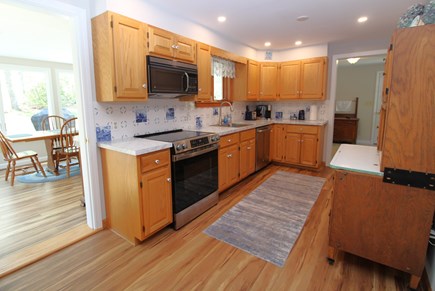 Orleans Cape Cod vacation rental - Kitchen with Sun Room In Background