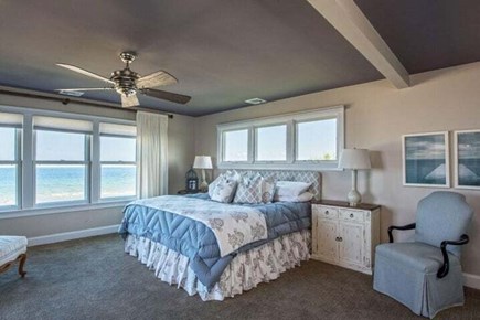 Dennis Cape Cod vacation rental - Primary bedroom with en suite bath and slider to large sundeck