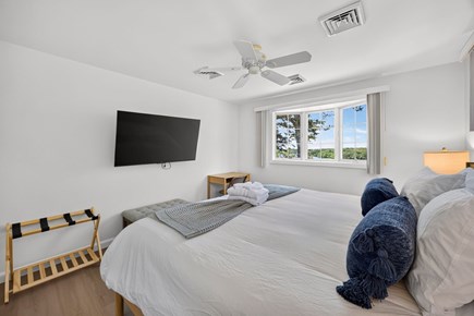 Brewster Cape Cod vacation rental - King Size Bedroom on Main Floor with desk and water views