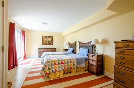 New Seabury, Popponesset Island Cape Cod vacation rental - Twin bedroom adjoining rec room.  Sliders to yard, kayaks, dock