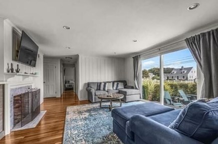 Falmouth, Historic Lower Acapesket area  Cape Cod vacation rental - Living room with natural light extends onto the front patio