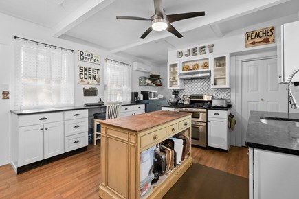 Centerville, Long Dell Inn Cape Cod vacation rental - Fully equipped kitchen with modern appliances and storage