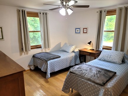 West Brewster Cape Cod vacation rental - Twin bedroom with a ceiling fan and plenty of storage space