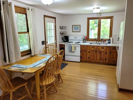 West Brewster Cape Cod vacation rental - Eat-in kitchen with a view to the private back yard