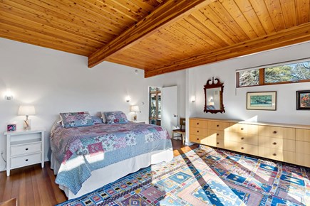 Wellfleet, Griffins Island Hideaway Cape Cod vacation rental - Primary bedroom with king bed, beamed ceiling