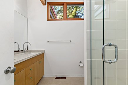 Wellfleet, Griffins Island Hideaway Cape Cod vacation rental - Full bathroom with glass shower and generous vanity storage