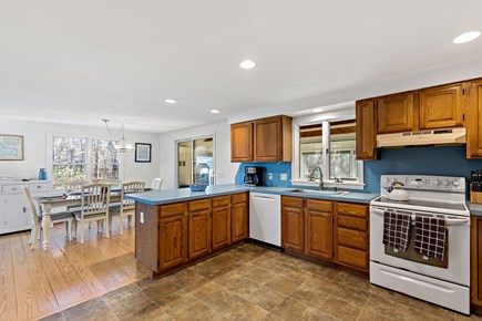 Eastham Getaway Cape Cod vacation rental - Kitchen with generous counter space and open to the dining area