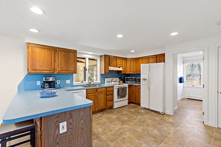 Eastham Getaway Cape Cod vacation rental - Bright kitchen with breakfast bar and full appliance setup