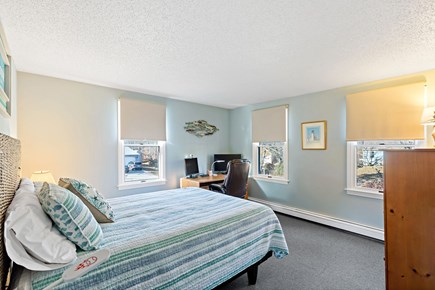 Eastham Getaway Cape Cod vacation rental - First floor King bedroom with desk and natural light