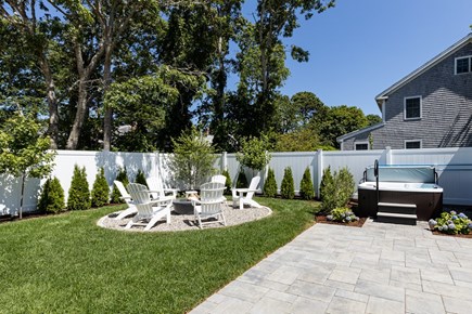 Popponesset Cape Cod vacation rental - Backyard with Firepit and Hot Tub!