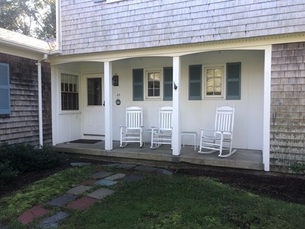 Centerville, Firefly Landing Cape Cod vacation rental - Front porch rocking chairs for morning coffee.