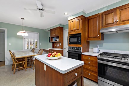 Centerville, Firefly Landing Cape Cod vacation rental - Bright kitchen view with prep island and lots of cabinets.