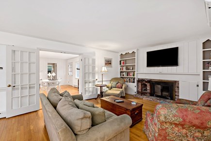 Centerville, Firefly Landing Cape Cod vacation rental - Cozy living room: fireplace, built-ins, flat-screen TV.