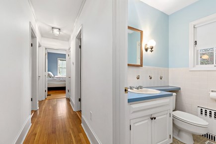 Centerville, Firefly Landing Cape Cod vacation rental - Hall bath with coastal blue accents—great for groups.