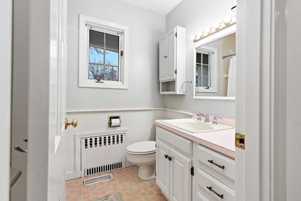 Centerville, Firefly Landing Cape Cod vacation rental - Extra bath with vanity and bright window for convenience.