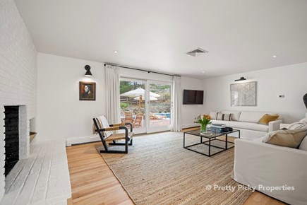 Barnstable Cape Cod vacation rental - Family room leading to pool area