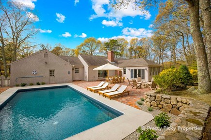 Barnstable Cape Cod vacation rental - Backyard pool and patio