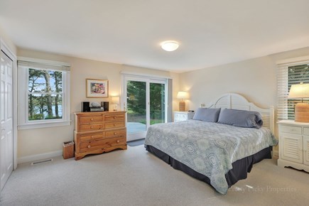 Brewster Cape Cod vacation rental - 1st floor primary bedroom with king-size bed and private bath.