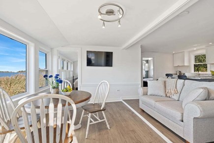 Orleans Cape Cod vacation rental - The Primary Queen bedroom is directly off the dining area