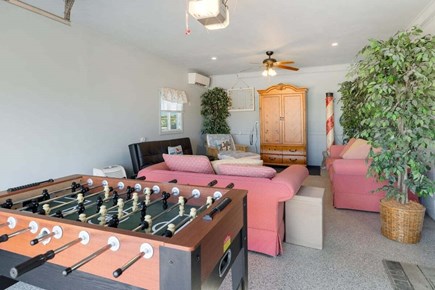 West Dennis Cape Cod vacation rental - Game Room with TV, AC, and Comfy Seating!