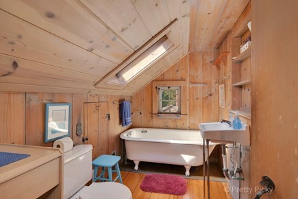 Harwich Cape Cod vacation rental - Second floor bathroom featuring a vanity and tub (no shower)
