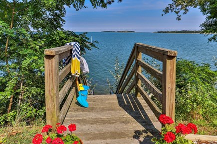 Harwich Cape Cod vacation rental - Staircase down to a rock revetment, a great place to enjoy a cup of coffee