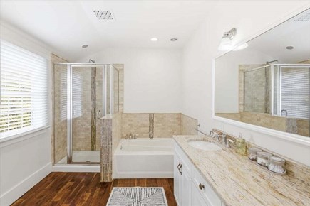 Chatham Cape Cod vacation rental - Second floor King bedroom private bath with a walk in shower and tub