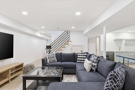 Chatham Cape Cod vacation rental - Finished lower level featuring a large sectional, ping pong table, foosball