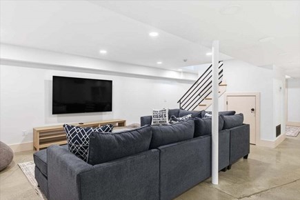 Chatham Cape Cod vacation rental - Finished lower level featuring a large sectional, ping pong table, foosball