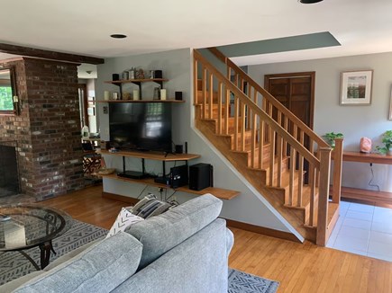 Brewster Cape Cod vacation rental - Living room TV & Downstairs Hallway