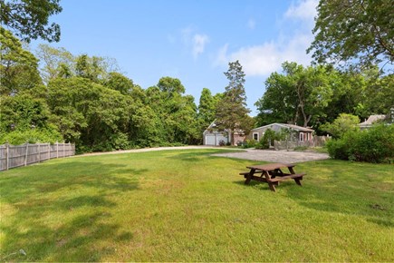 Eastham Cape Cod vacation rental - Large yard with horse shoe pit, corn hole and fire pit.