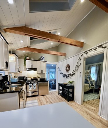 Truro Cape Cod vacation rental - Bright open kitchen and living area with vaulted ceilings