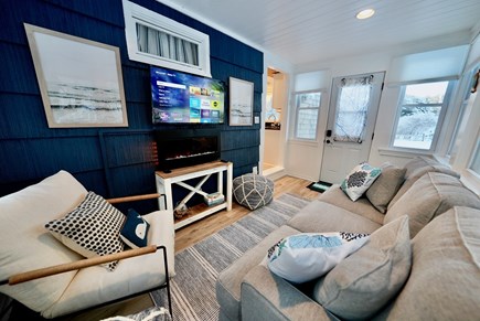 Truro Cape Cod vacation rental - Cozy sitting area with smart TV and adjacent dining space