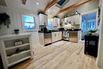Truro Cape Cod vacation rental - Kitchen view showing open layout and easy flow to living areas