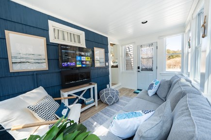 Truro Cape Cod vacation rental - Cozy sitting area with electric fireplace, smart TV & WIFI.