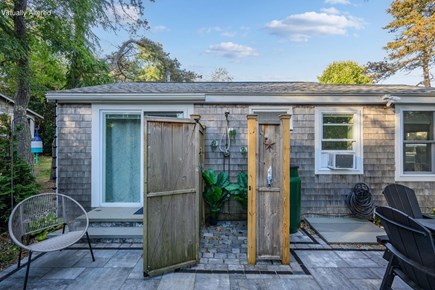 Truro Cape Cod vacation rental - Outdoor shower and rear entrance to the cottage