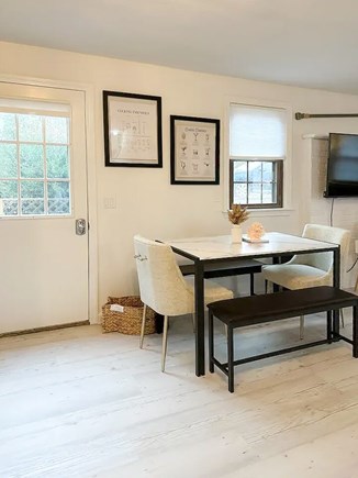 Falmouth Cape Cod vacation rental - Versatile seating with a mix of chairs and a bench