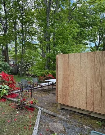 Falmouth Cape Cod vacation rental - Outdoor shower, grill, picnic table, and backyard space