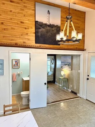 Falmouth Cape Cod vacation rental - Open hallway connecting living, dining, and bedrooms