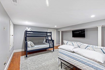 Yarmouthport Estate Cape Cod vacation rental - Lower level bedroom with full bed and pyramid style bunkbed