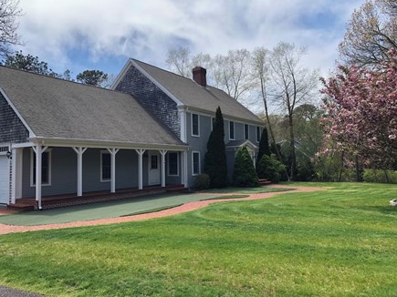 Yarmouthport Estate Cape Cod vacation rental - Front of house, with large yard and putting green