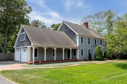 Yarmouthport Estate Cape Cod vacation rental - Front of house, with large yard and putting green