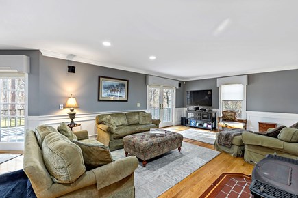 Yarmouthport Estate Cape Cod vacation rental - Comfy living room with big TV and sliders