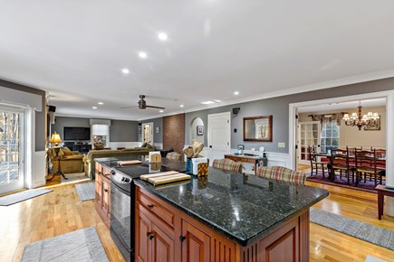 Yarmouthport Estate Cape Cod vacation rental - Kitchen views to dining and living areas