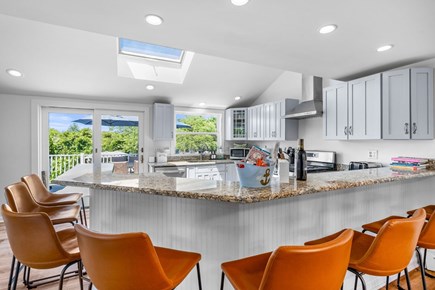 West Dennis Cape Cod vacation rental - Kichen with island and seating