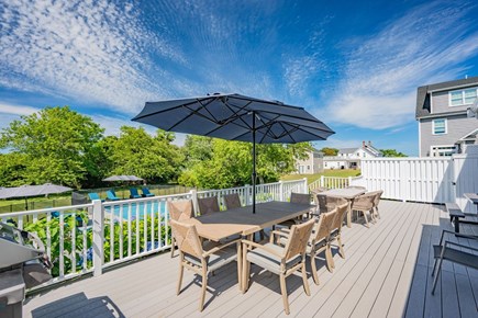 West Dennis Cape Cod vacation rental - Back deck with outdoor dining